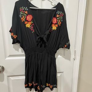 Black Romper With Floral Pattern